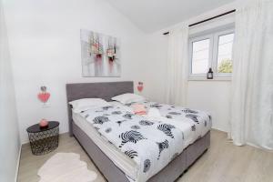 Postel nebo postele na pokoji v ubytování Villa Valeo + 20 fotografií