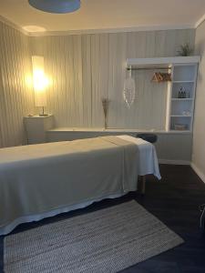 Postel nebo postele na pokoji v ubytování Hôtel Far Hills