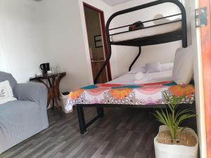 Postel nebo postele na pokoji v ubytování Casa Nimbu Rainforest