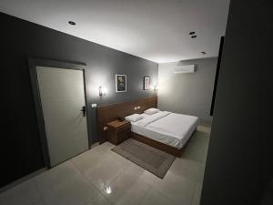 Postel nebo postele na pokoji v ubytování Regal view Aparthotel