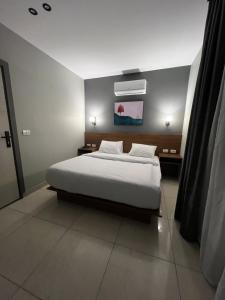 Postel nebo postele na pokoji v ubytování Regal view Aparthotel