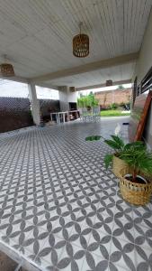 a patio with a black and white tiled floor at La beethoven YB in Yerba Buena