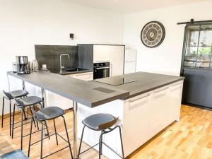 Kuchyň nebo kuchyňský kout v ubytování Appartement côté jardin - centre + 16 fotografií
