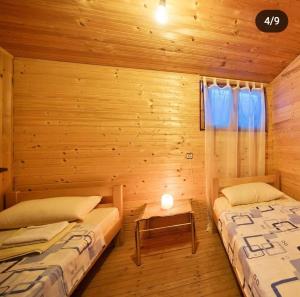 Postel nebo postele na pokoji v ubytování Sunset 3