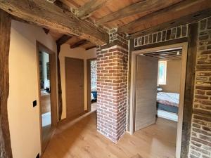 Postel nebo postele na pokoji v ubytování Ancienne ferme totalement rénové moderne à Baelen