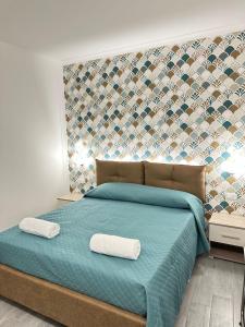Postel nebo postele na pokoji v ubytování Costa degli Dei Rooms