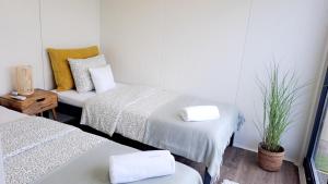 Ένα ή περισσότερα κρεβάτια σε δωμάτιο στο Domki w Zatorze +4 φωτογραφίες