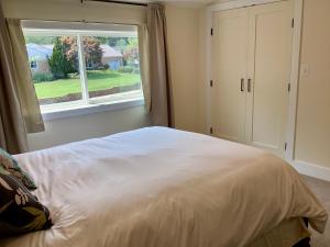 a bedroom with a large bed and a window at Riva Loft with a View in Riva