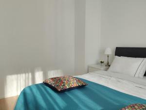 Posteľ alebo postele v izbe v ubytovaní Apartament CENTRUM/STARÓWKA Gdańsk