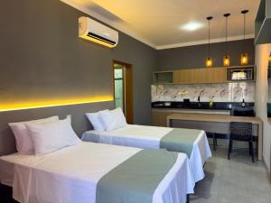 Kuchyň nebo kuchyňský kout v ubytování Ondara Flat Hotel