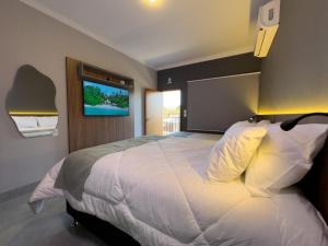 Postel nebo postele na pokoji v ubytování Ondara Flat Hotel