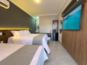 TV a/nebo společenská místnost v ubytování Ondara Flat Hotel