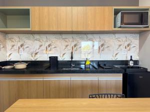Kuchyň nebo kuchyňský kout v ubytování Ondara Flat Hotel