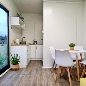 Η κουζίνα ή μικρή κουζίνα στο Domki w Zatorze