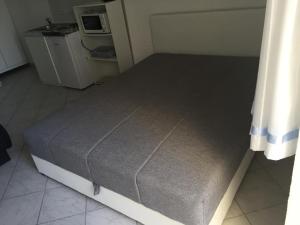 Ένα ή περισσότερα κρεβάτια σε δωμάτιο στο Villa Manjo