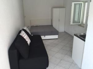 Ένα ή περισσότερα κρεβάτια σε δωμάτιο στο Villa Manjo