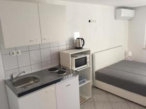 Η κουζίνα ή μικρή κουζίνα στο Villa Manjo