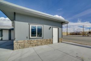 a small building with a door and a window at Renovated Hawthorne Apartment By Museums and Dining! in Hawthorne