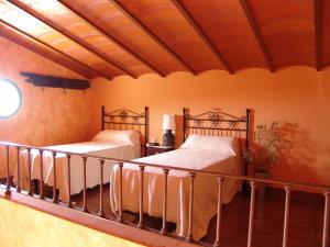 Posteľ alebo postele v izbe v ubytovaní Casas Rurales Cortijo la Cañada