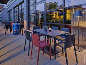 Ein Restaurant oder anderes Speiselokal in der Unterkunft Dorint Parkhotel Frankfurt / Bad Vilbel 