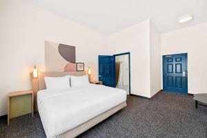 Postel nebo postele na pokoji v ubytování Spark By Hilton Longview