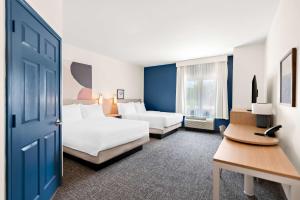 Postel nebo postele na pokoji v ubytování Spark By Hilton Longview
