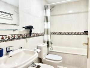 A bathroom at Costa Del Sol Seaside Studio - 5 Mins From Beach