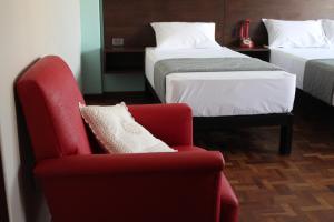 Postel nebo postele na pokoji v ubytování Kunan Hotel