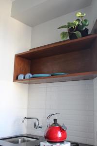 Kuchyň nebo kuchyňský kout v ubytování Kunan Hotel