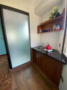 Kuchyň nebo kuchyňský kout v ubytování Kunan Hotel