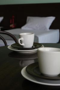 Příslušenství pro přípravu čaje a kávy v ubytování Kunan Hotel