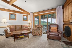 a living room with a couch and two chairs at Hot Tub, Loft with Balcony, Great Views, 2 Bedrooms, 30 Plus Night Rentals Welcome in Steamboat Springs