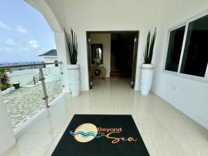 a welcome mat on the floor of a house at Hospitality Expert BTS 1 - Pool Beach & Chef in Montego Bay