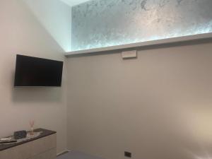 TV a/nebo společenská místnost v ubytování Reggina Stadium