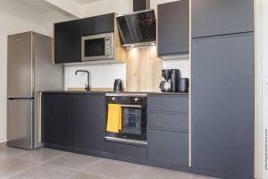 Cucina o angolo cottura di Navira - Appartement Villa Real