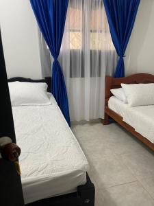 Giường trong phòng chung tại Mediterráneo Relax