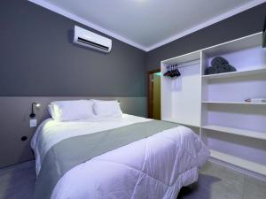 Postel nebo postele na pokoji v ubytování Ondara Flat Hotel