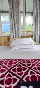 Zero Points TheLaure Cottage 객실 침대