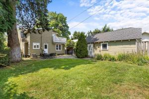 a house and a yard with a house at C Street Charm in Coeur d'Alene