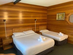 Ένα ή περισσότερα κρεβάτια σε δωμάτιο στο Ascot Motor Inn