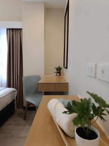 Voodi või voodid majutusasutuse Kimtons Apartment Suite Capitol Site toas