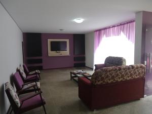 TV a/nebo společenská místnost v ubytování Iria's Hotel
