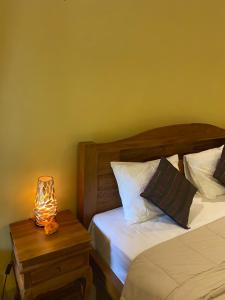 Postel nebo postele na pokoji v ubytování Bali Asli Guest House by EPS