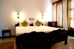 Postel nebo postele na pokoji v ubytování Dephani Beach Hotel
