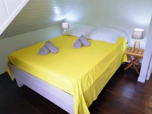 Voodi või voodid majutusasutuse Diamant Vert - Villa Bwa d'Ô, entre mer & montagnes toas