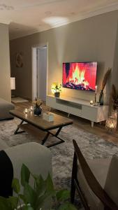 Et tv og/eller underholdning på شقة مفروشة خاصه بالخبر