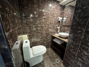 Koupelna v ubytování Wecity Hotel 薇城精緻旅店