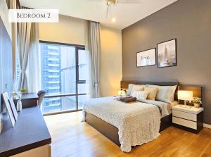 a bedroom with a bed and a large window at St Mary Kuala Lumpur Homestay Bathtub & Walk to Pavilion Bukit Bintang by Cloud Host in Kuala Lumpur +45 photos