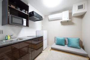 Kuchyň nebo kuchyňský kout v ubytování CH RESIDENCE Kikuicho