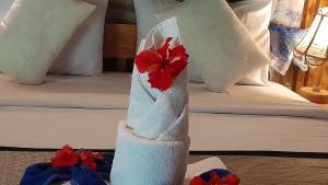 Bayan Exotic Homestay客房内的一张或多张床位